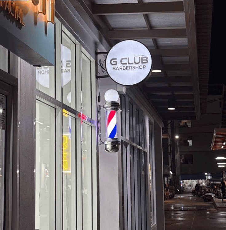 Sign Of G club Barbershop Infornt of the lcoation of the barbershop